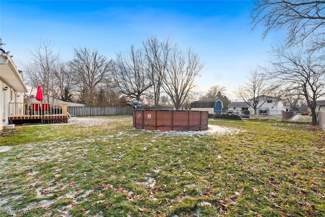 view of yard featuring a swimming pool side deck