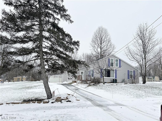 view of front of house featuring central AC