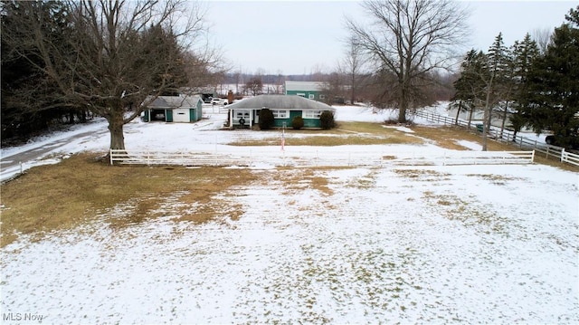 view of yard layered in snow