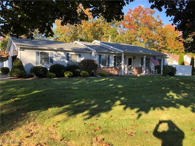 single story home with a front yard