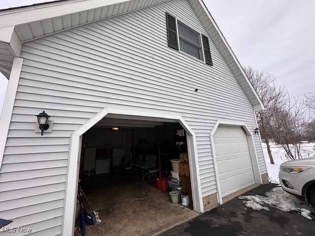 view of snow covered garage