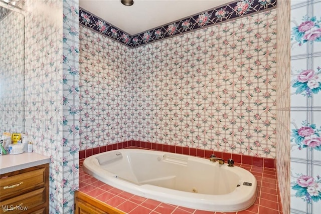 bathroom with a relaxing tiled tub and vanity