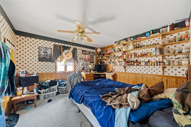 bedroom with ceiling fan and carpet