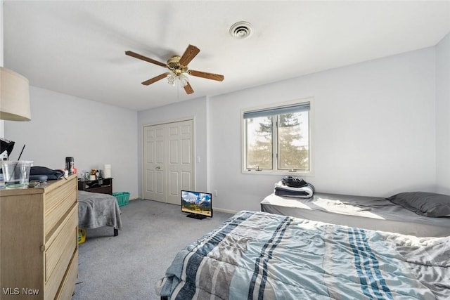 bedroom with light colored carpet and ceiling fan