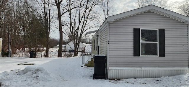 view of snow covered property