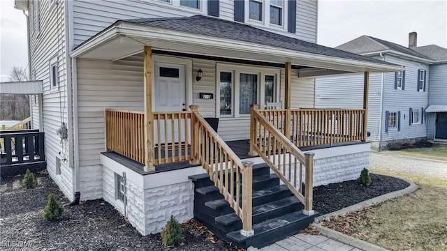 doorway to property with covered porch