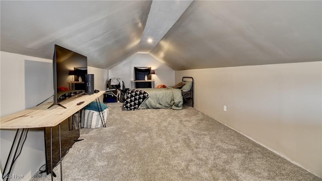 bedroom with lofted ceiling and carpet floors