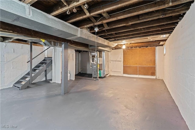 basement featuring heating unit