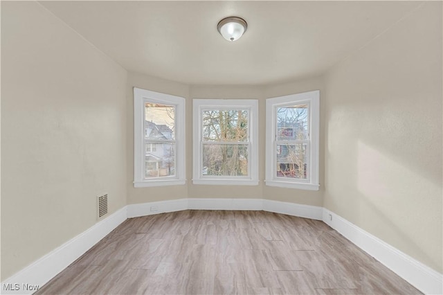 empty room featuring light hardwood / wood-style flooring