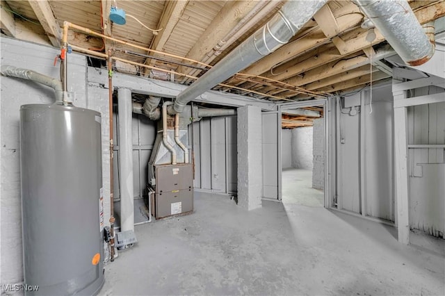 basement with heating unit and gas water heater