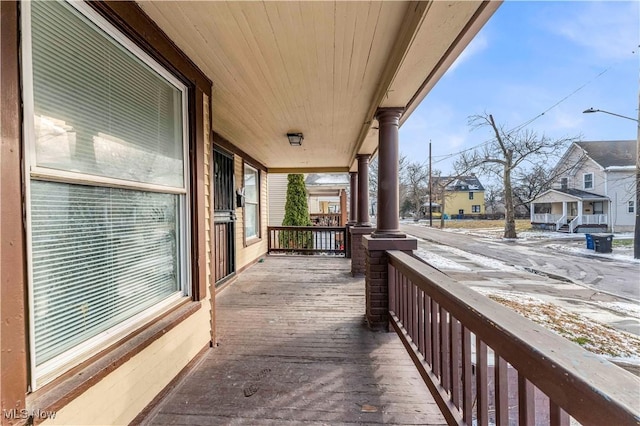 wooden deck featuring covered porch