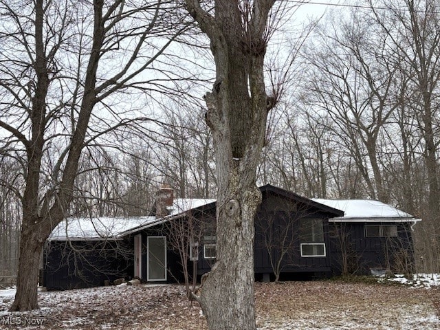 view of snow covered property