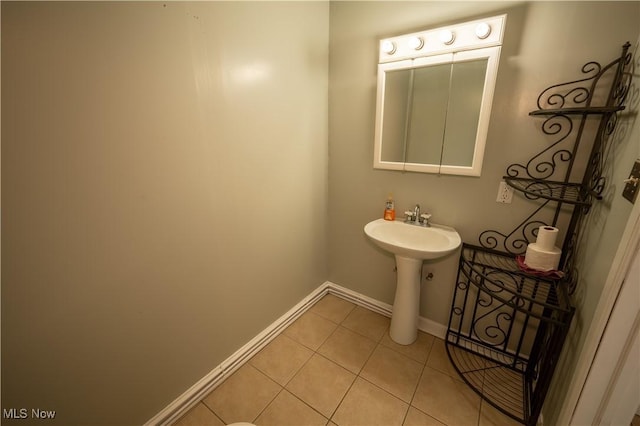 bathroom featuring sink and tile patterned floors