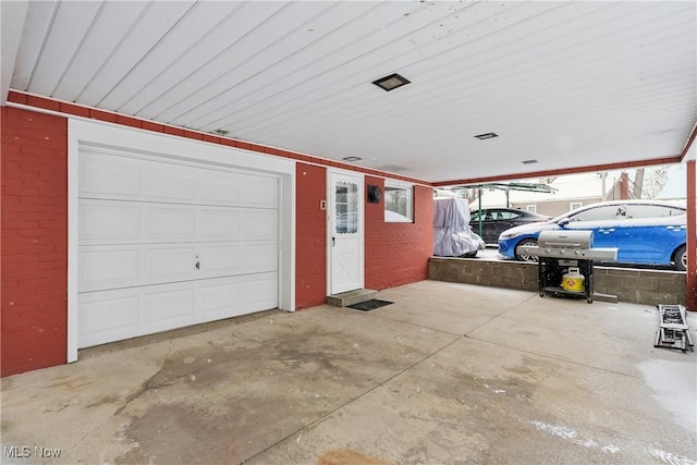 garage with a carport