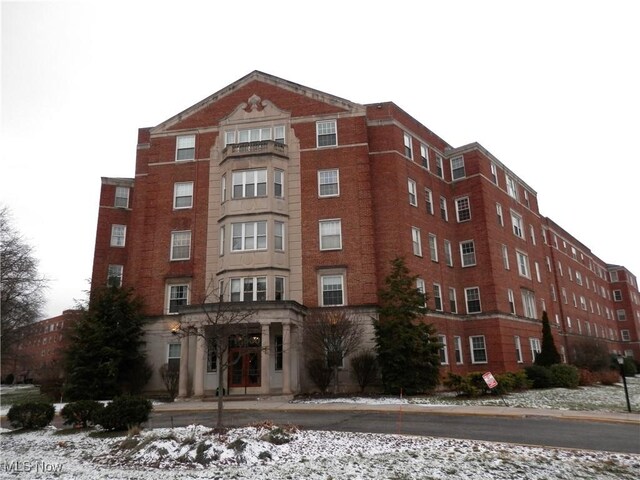 view of snow covered property