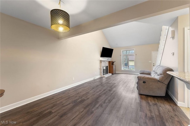 1260 Boardman-Canfield Rd # 29, Boardman, OH 44512 - unfurnished living room with dark hardwood / wood-style floors and vaulted ceiling with beams