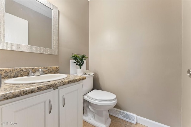 1260 Boardman-Canfield Rd # 29, Boardman, OH 44512 - bathroom featuring vanity, tile patterned floors, and toilet