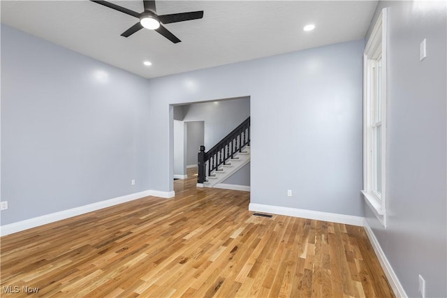 interior space with light hardwood / wood-style flooring and ceiling fan