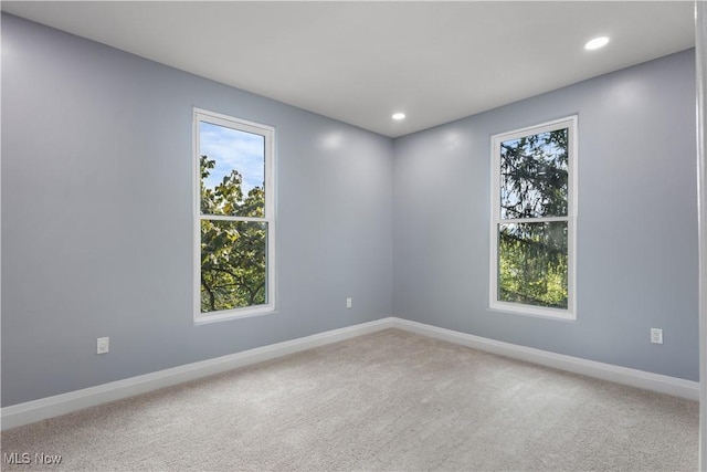 view of carpeted spare room