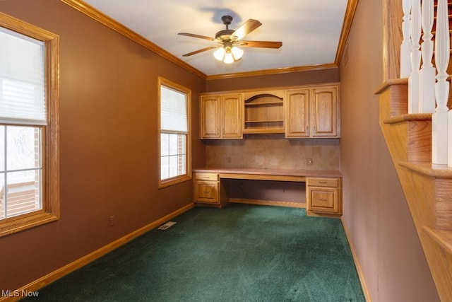 615 Crystal Brooke Dr, Hinckley, OH 44233 - unfurnished office featuring built in study area, dark carpet, crown molding, ceiling fan, and baseboards
