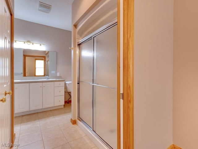 615 Crystal Brooke Dr, Hinckley, OH 44233 - full bathroom with a shower stall, toilet, vanity, and tile patterned floors