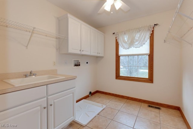 615 Crystal Brooke Dr, Hinckley, OH 44233 - clothes washing area with electric dryer hookup, washer hookup, cabinet space, a ceiling fan, and baseboards