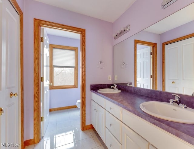 615 Crystal Brooke Dr, Hinckley, OH 44233 - full bathroom featuring baseboards, toilet, tile patterned flooring, and double vanity