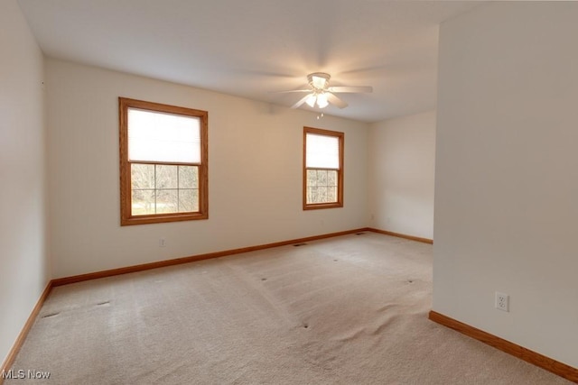 615 Crystal Brooke Dr, Hinckley, OH 44233 - carpeted empty room featuring a ceiling fan and baseboards
