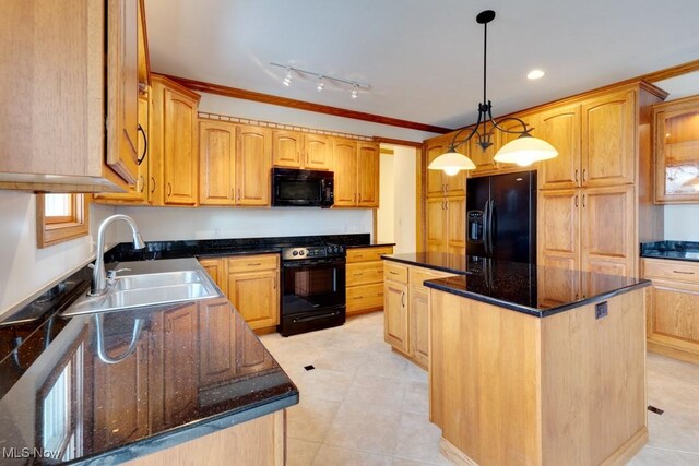 615 Crystal Brooke Dr, Hinckley, OH 44233 - kitchen with black appliances, a sink, a kitchen island, dark stone countertops, and light tile patterned floors