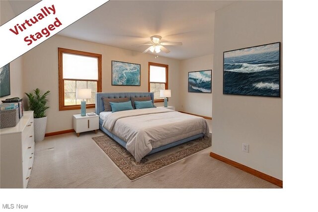 615 Crystal Brooke Dr, Hinckley, OH 44233 - carpeted bedroom with baseboards and a ceiling fan