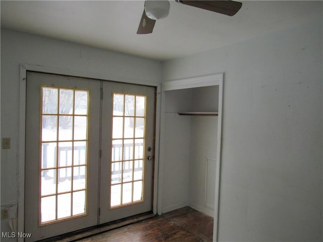 doorway to outside with ceiling fan, dark wood-type flooring, and french doors