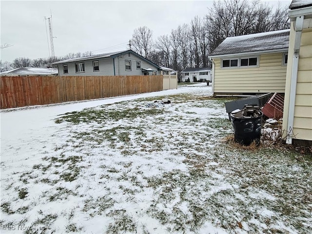 view of yard covered in snow