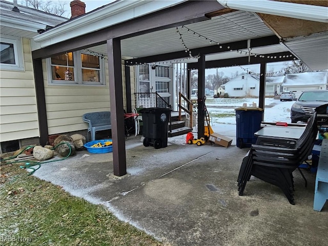 view of snow covered patio