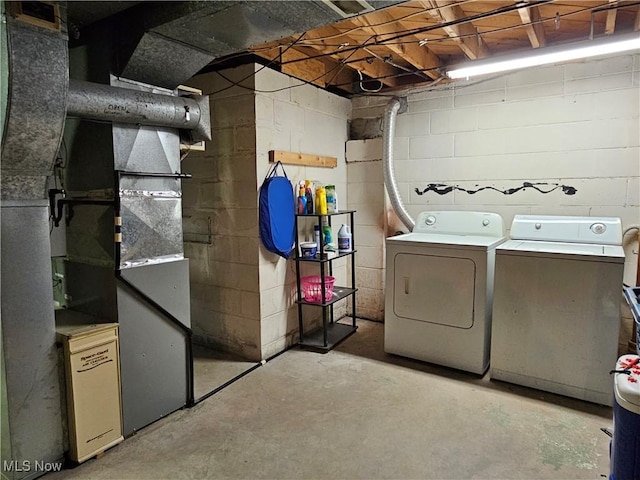 washroom with washer and dryer