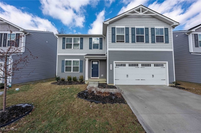 view of front of home with an attached garage, driveway, and a front lawn