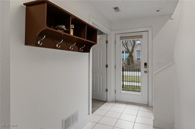2280 City View Dr, Cleveland, OH 44113 - doorway to outside with light tile patterned floors