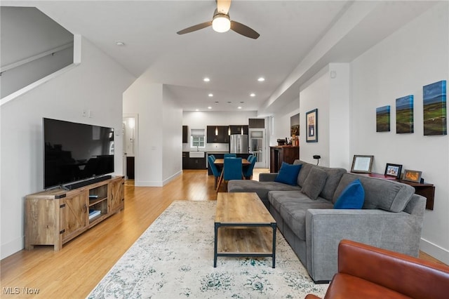 2280 City View Dr, Cleveland, OH 44113 - living room with ceiling fan and light hardwood / wood-style flooring