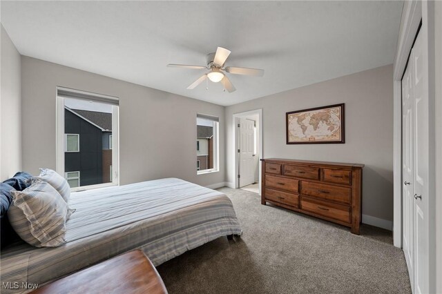 2280 City View Dr, Cleveland, OH 44113 - carpeted bedroom featuring ceiling fan and a closet
