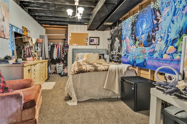 carpeted bedroom featuring a closet and refrigerator