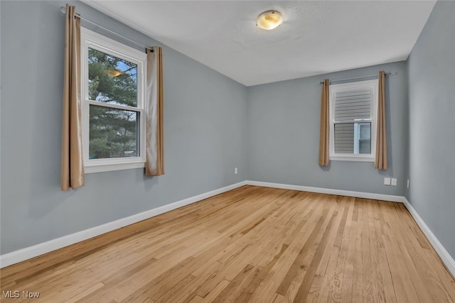 bonus room with light hardwood / wood-style floors