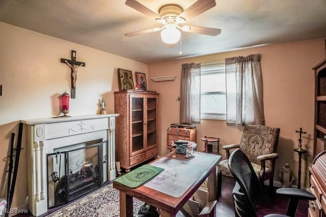 living area with ceiling fan