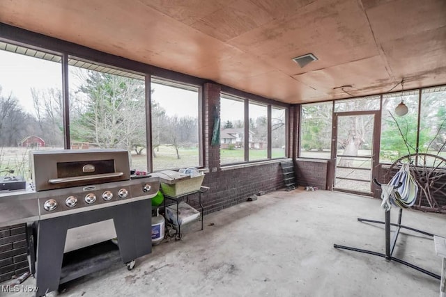 sunroom with a healthy amount of sunlight