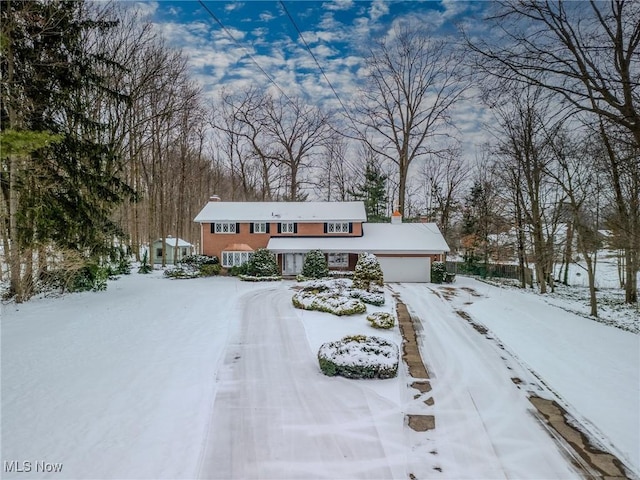 raised ranch featuring a garage