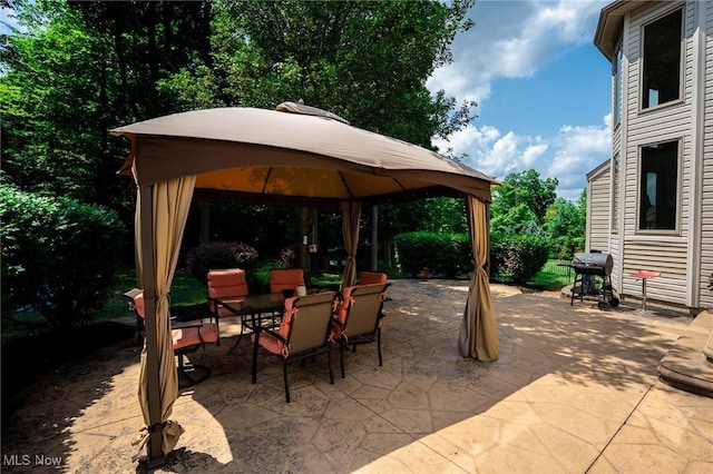 view of patio / terrace featuring a gazebo and grilling area