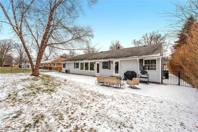 view of snow covered house