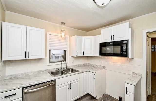 kitchen featuring dishwasher, sink, and white cabinets