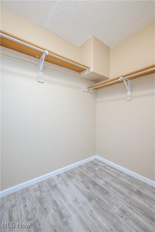 1145 Cookhill Cir, Akron, OH 44312 - spacious closet with wood finished floors