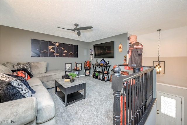 1145 Cookhill Cir, Akron, OH 44312 - carpeted living area with a textured ceiling, baseboards, and a ceiling fan