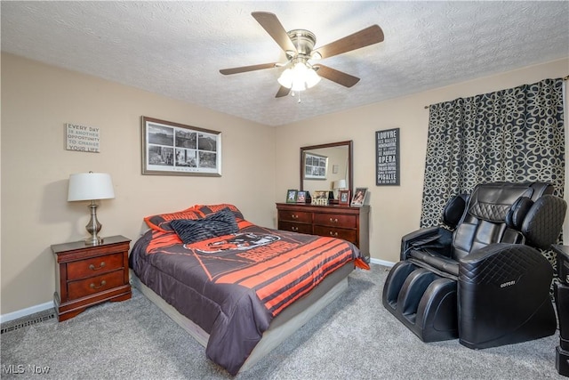 1145 Cookhill Cir, Akron, OH 44312 - carpeted bedroom featuring ceiling fan, a textured ceiling, and baseboards