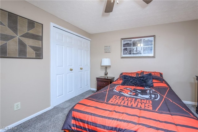 1145 Cookhill Cir, Akron, OH 44312 - carpeted bedroom featuring baseboards, a closet, ceiling fan, and a textured ceiling